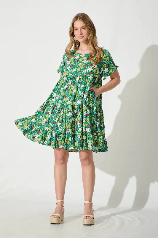 Only a Few Left – Order Now!Carisse Smock Dress in Jade with Multi Floral