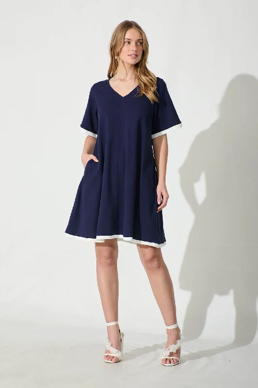 Your Shopping Spree Starts Here!Emery Dress in Navy with White Contrast Trim Cotton
