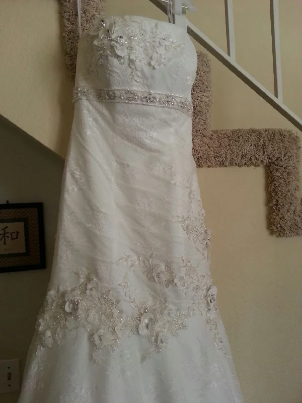 Find Your Perfect Deal Today!Oleg Cassini Lace Fit and Flare Gown with Floral Details CWG377