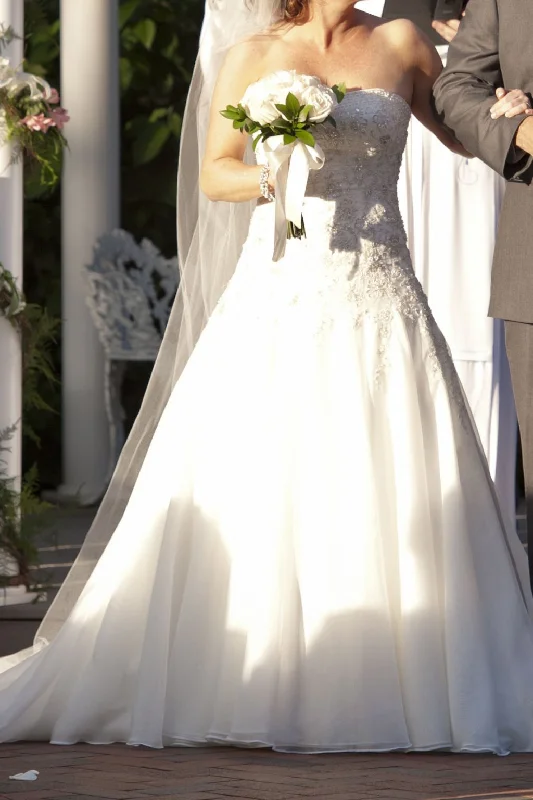 Steals and Deals Await!Oleg Cassini Strapless, beaded, lace, organza dress.