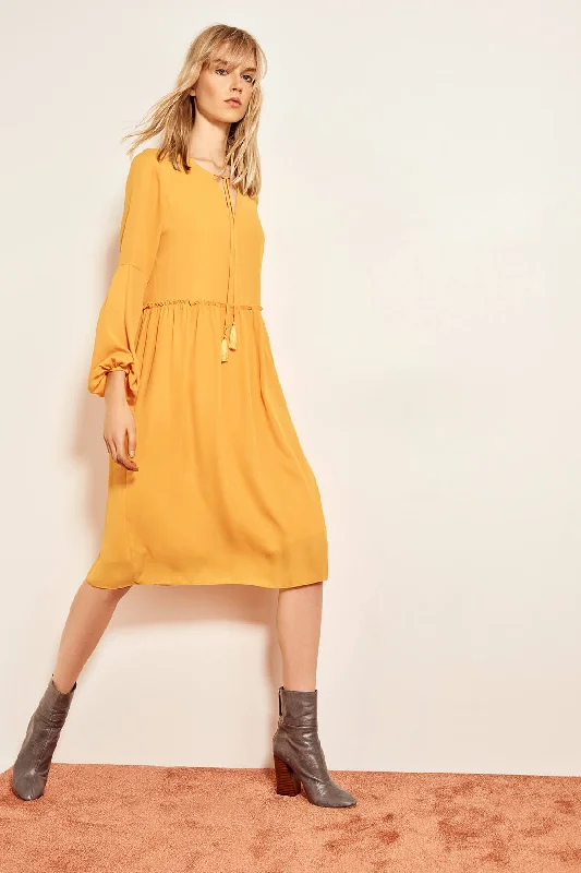 Shop Now and Save!Mustard Tasseled dress