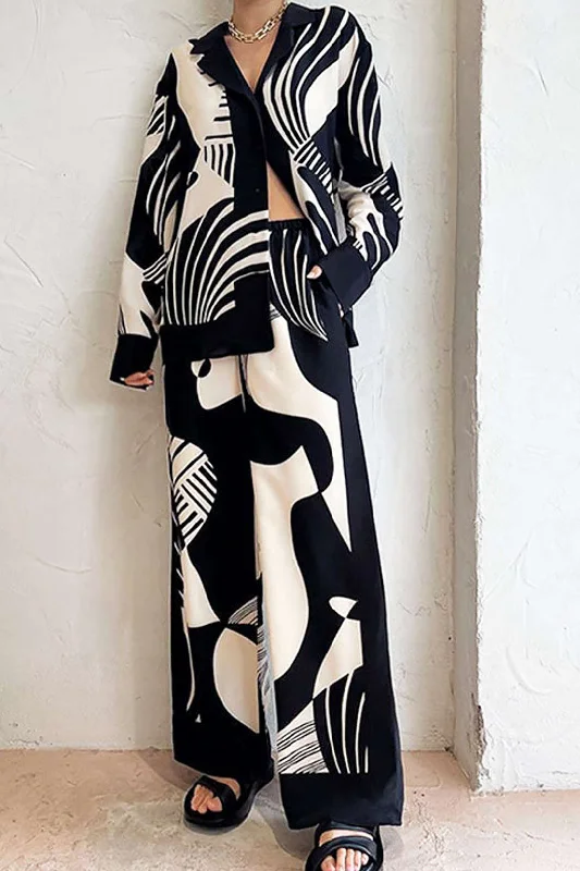 Don’t Wait – Shop Today!Printed V-neck Button Up Long Sleeve Shirt And Wide Leg Pants Set Don’t Wait – Shop Today!Printed V-neck Button Up Long Sleeve Shirt And Wide Leg Pants Set